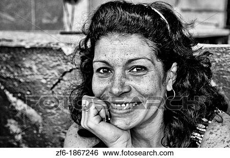 Portrait of pretty woman aged 38 in Havana Cuba at home View Large Photo Image Stock Photograph - Portrait of pretty woman aged 38 in Havana Cuba at home. Fotosearch
