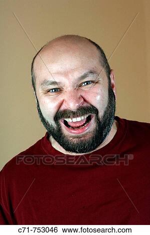 Portrait of russian man laughing in camera View Large Photo Image Stock Photograph - Portrait of russian man laughing in camera. Fotosearch