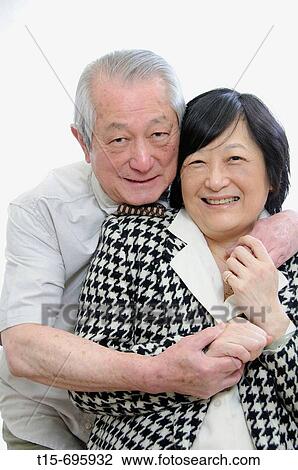 Portrait of senior asian couple having fun together View Large Photo Image Stock Image - Portrait of senior asian couple having fun together. Fotosearch