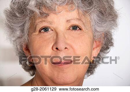Portrait of Senior woman with grey hair smiling, and happy View Large Photo Image Stock Photo - Portrait of Senior woman with grey hair smiling, and happy. Fotosearch