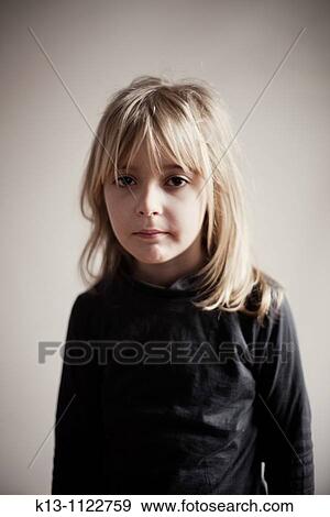 Portrait of serious girl View Large Photo Image Stock Photo - Portrait of serious girl. Fotosearch