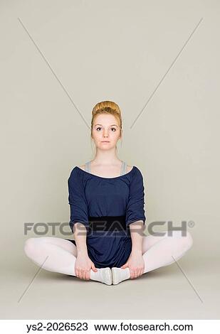 Portrait of serious young blond female teenager in ballet dress. View Large Photo Image Stock Image - Portrait of serious young blond female teenager in ballet dress.. Fotosearch