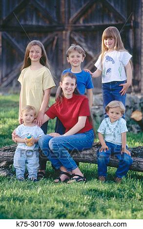 Stock Photo - portrait of six siblings in the country. Fotosearch