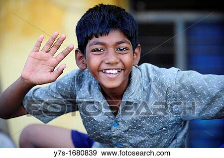 Portrait of smiling boy in Madurai, Tamil Nadu, South India, India, Asia View Large Photo Image Stock Photo - Portrait of smiling boy in Madurai, Tamil Nadu, South India, India, Asia. Fotosearch