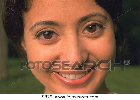 Stock Photo - Portrait of smiling girl. Fotosearch