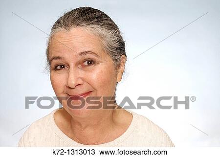 Portrait of smiling older woman View Large Photo Image Stock Image - Portrait of smiling older woman. Fotosearch