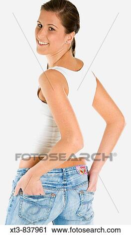 portrait of standing woman (rear view) View Large Photo Image Stock Image - portrait of standing woman (rear view). Fotosearch
