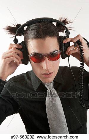 Portrait of teen boy wearing headset, and red sunglasses. View Large Photo Image Stock Image - Portrait of teen boy wearing headset, and red sunglasses.. Fotosearch