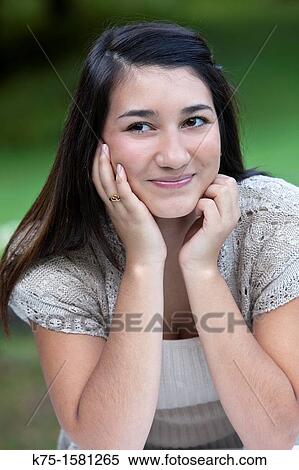 Stock Photography - Portrait of teen girl outdoors. Fotosearch