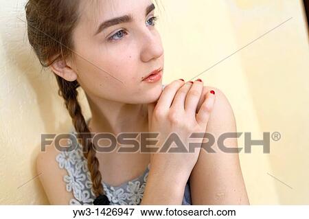 Portrait of teenage girl indoors with braid View Large Photo Image Stock Photo - Portrait of teenage girl indoors with braid. Fotosearch