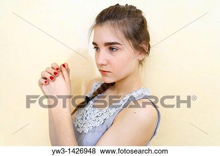 Portrait of teenage girl indoors with braid View Large Photo Image Stock Photo - Portrait of teenage girl indoors with braid. Fotosearch