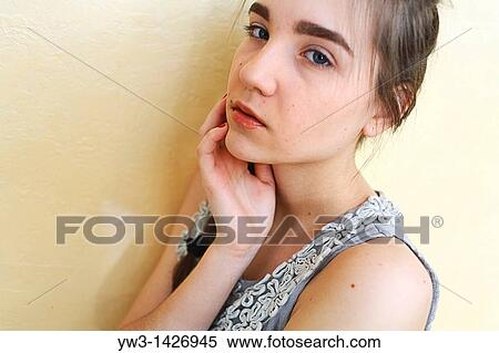 Portrait of teenage girl indoors with braid View Large Photo Image Stock Photography - Portrait of teenage girl indoors with braid. Fotosearch