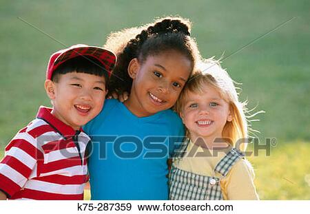 Stock Photo - Portrait of three children. Fotosearch