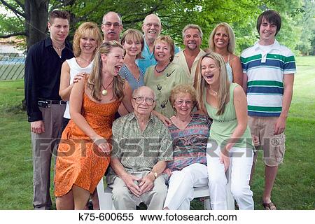 Stock Photography - Portrait of three generations family. Fotosearch