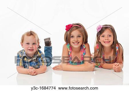 Picture - Portrait of three happy children. Fotosearch