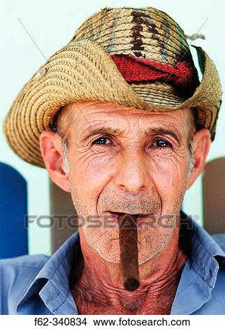 Portrait of tobacco farmer smoking cigar. Viales. Cuba View Large Photo Image Picture - Portrait of tobacco farmer smoking cigar. Viales. Cuba. Fotosearch