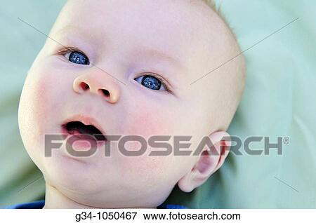 Stock Photo - Portrait of toddler. Fotosearch
