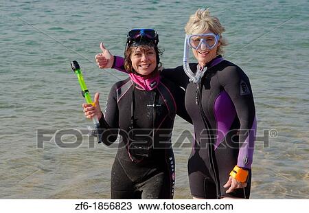 Portrait of tourist snorkling in Galapagos Islands in Ecuador South America View Large Photo Image Stock Image - Portrait of tourist snorkling in Galapagos Islands in Ecuador South America. Fotosearch