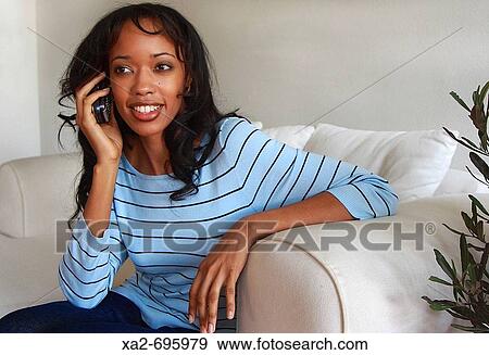 Portrait of upscale woman talking on cell phone View Large Photo Image Stock Photo - Portrait of upscale woman talking on cell phone. Fotosearch