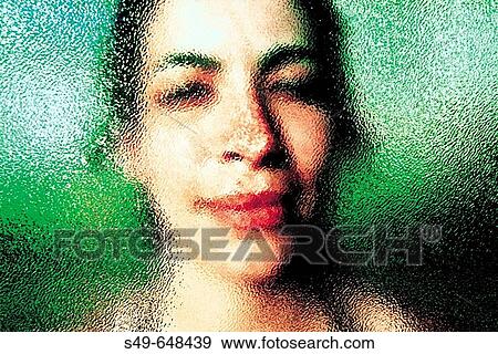 Portrait of woman behind a translucent glass View Large Photo Image Stock Photo - Portrait of woman behind a translucent glass. Fotosearch