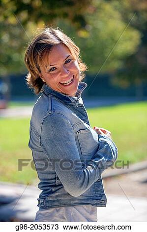 Stock Image - Portrait of woman gesticulating.. Fotosearch