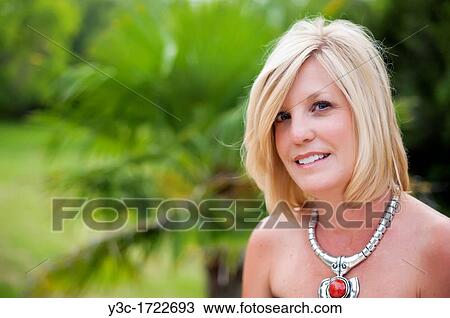 Portrait of woman in her fourties View Large Photo Image Stock Image - Portrait of woman in her fourties. Fotosearch