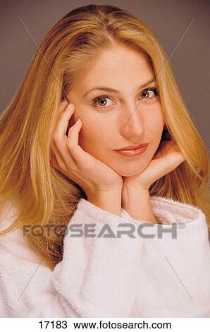 Stock Image - Portrait of woman in robe. Fotosearch