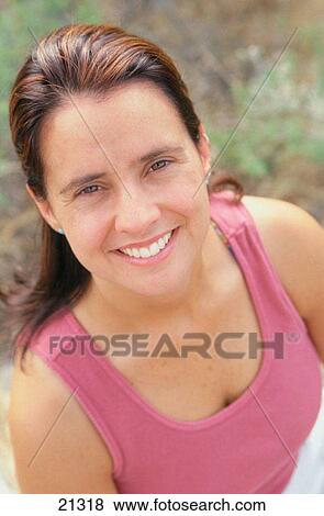 Portrait of woman in tank top View Large Photo Image Stock Photo - Portrait of woman in tank top. Fotosearch
