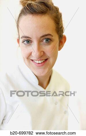 Portrait of woman in white coat View Large Photo Image Stock Image - Portrait of woman in white coat. Fotosearch