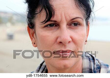 Stock Photography - Portrait of woman on the Malagueta beach, Malaga, Andalucia, Spain. Fotosearch