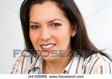 Stock Photograph - Portrait of woman smiling. Fotosearch