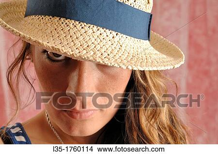 Picture - Portrait of woman wearing a hat. Fotosearch