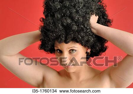 Picture - Portrait of woman wearing a wig. Fotosearch