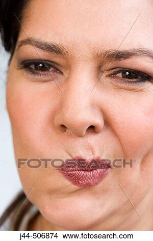 Portrait of woman with twisted mouth View Large Photo Image Picture - Portrait of woman with twisted mouth. Fotosearch
