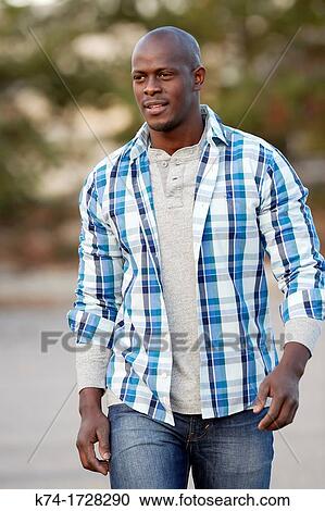 Stock Image - portrait of young black man. Fotosearch