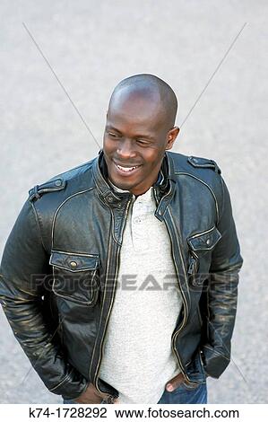 Stock Image - portrait of young black man. Fotosearch