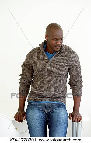 Stock Image - portrait of young black man. Fotosearch