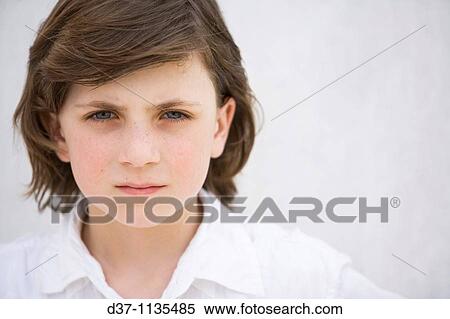 Stock Photography - Portrait of young boy. Fotosearch