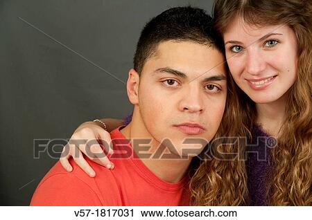 Stock Image - Portrait of young couple in love. Close view.. Fotosearch