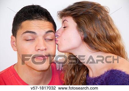 Stock Image - Portrait of young couple in love. Close view.. Fotosearch