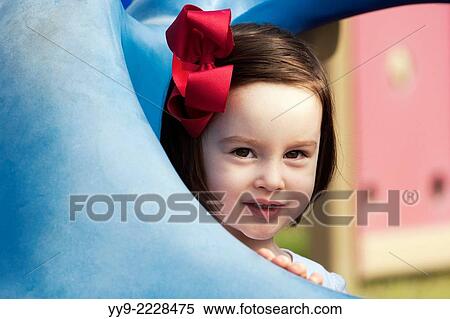 Stock Photography - Portrait of Young Girl at Playground - Florida, USA.. Fotosearch