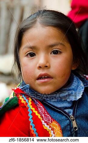 Portrait of young girl with traditional dress in Cusco Cuzco Peru South America View Large Photo Image Picture - Portrait of young girl with traditional dress in Cusco Cuzco Peru South America. Fotosearch