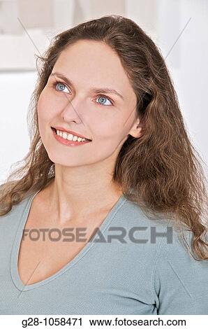 portrait of young happy woman smiling View Large Photo Image Stock Image - portrait of young happy woman smiling. Fotosearch