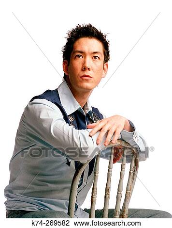 Stock Image - Portrait Of Young Man In Cowboy Shirt. Fotosearch