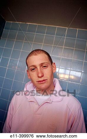 Stock Photograph - Portrait of young man, lifestyle. Fotosearch