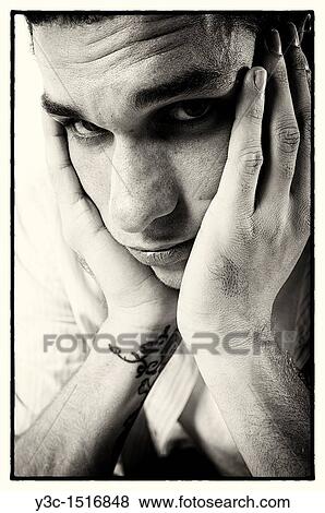Stock Photo - Portrait of young man. Fotosearch