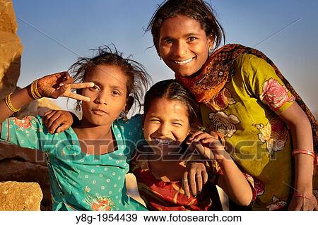 Stock Photo - Portrait of young smiling indian girls, Jaisalmer, India.. Fotosearch