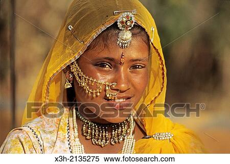 portrait of young woman at Shilpgram Village around Udaipur, State of Rajasthan, India, South Asia. View Large Photo Image Stock Photography - portrait of young woman at Shilpgram Village around Udaipur, State of Rajasthan, India, South Asia.. Fotosearch
