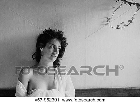 Stock Image - Portrait of young woman. Black and white.. Fotosearch