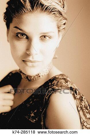 Portrait of Young Woman Gazing At Camera View Large Photo Image Stock Photo - Portrait of Young Woman Gazing At Camera. Fotosearch